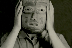 Tintype of Man Holding African Mask