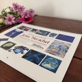 12 beautiful prints made in tribute to Sir John Herschel illustrate the calendar.